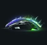 Gaming mouse with a bright rainbow RGB arc streaming over it on a dark background, highlighting its design and lighting.