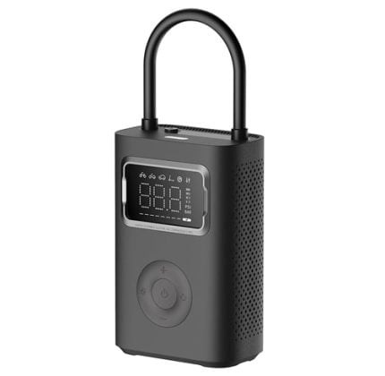 Portable black tire inflator/air pump with a digital pressure display, circular control pad, and a large U-shaped handle on top.