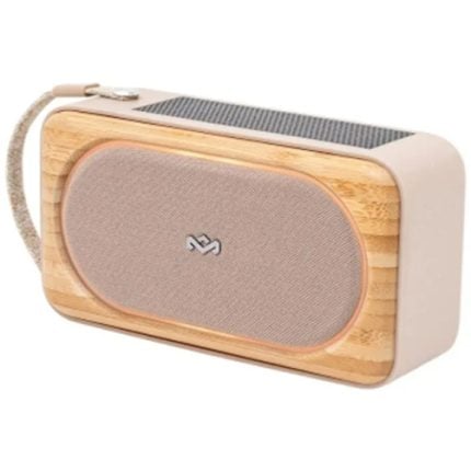 Portable Bluetooth speaker with a wooden front, fabric grille, and a beige body, featuring a carrying strap on top.
