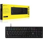 Corsair K70 Core mechanical gaming keyboard with RGB backlighting, shown beside its yellow packaging box.