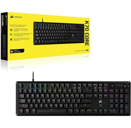 Corsair K70 Core mechanical gaming keyboard with RGB backlighting, shown beside its yellow packaging box.