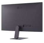 Rear view of a dark LG monitor on a stand, showing HDMI, USB, and audio ports on the back panel.
