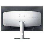 Rear view of a Xiaomi computer monitor on a stand, facing away from the viewer.