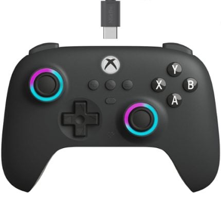 Black Xbox wireless controller with glowing cyan/purple rings around the left and right sticks, and a USB dongle above it.