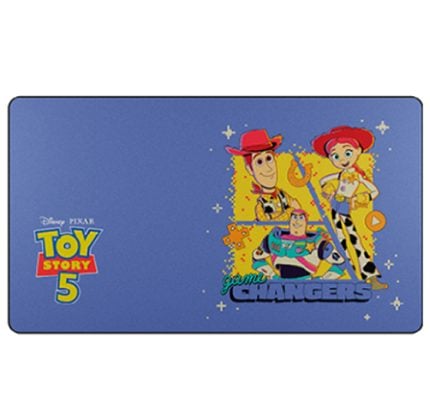 Promotional banner for Toy Story 5: Game Changers, with Woody and Jessie on a blue background.