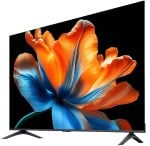 Flat-screen TV on a stand displaying a bright orange and blue flower wallpaper on a black background with slim bezels.
