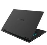Black Gigabyte gaming laptop closed at an angle, with a teal accent glow visible on the side edge.