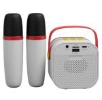 Two wireless microphones standing upright beside a small portable speaker with a red handle, ready for karaoke or events.