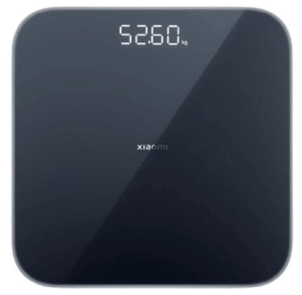 Square, dark glass digital scale showing 52.60 kg; brand 'Xiaomi' visible.