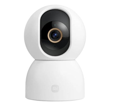 White Xiaomi Mi security camera on a rounded stand, front-facing lens in a black surround with a beige ring.