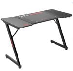 Black gaming desk with carbon-fiber textured top and angled twin-leg frame, shown from a side angle.