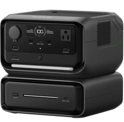 EcoFlow portable power station with digital display and built‑in outlets on a matching dock, black and compact.
