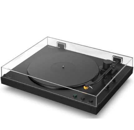 Black vinyl record turntable with a clear dust cover, tonearm on the right, and control buttons along the front edge.