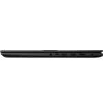 Side view of a black laptop with several ports along the edge (USB, HDMI, Ethernet, audio jack) visible