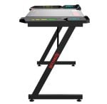 Treadmill desk on a black crisscross stand with a wide running belt and color-coded controls at the ends.