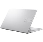 Slim silver laptop slightly open, viewed from the side against a white background.