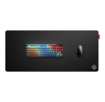 Large black gaming mouse pad with a rainbow-lit keyboard and a black mouse, SteelSeries logo in the bottom-right corner
