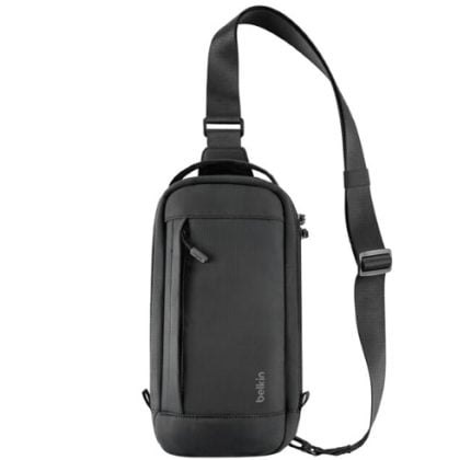 Black compact sling bag with adjustable strap and front zip pocket, Belkin branding visible on the side edge.