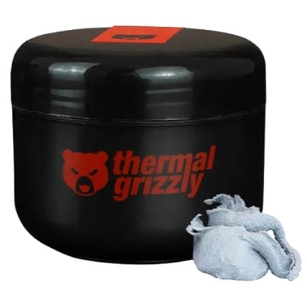 Black jar of Thermal Grizzly thermal paste with a red logo and a light blue cleaning cloth beside it on a white background.