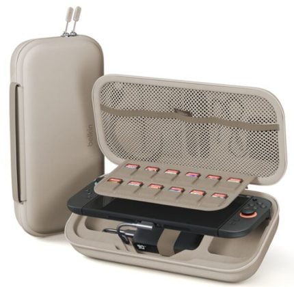 Beige travel case opened to reveal a handheld game console with multiple game cartridges in the lid and a mesh pocket above.