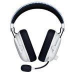 White over-ear headphones with black padded cups and an attached boom microphone; blue stitched headband visible