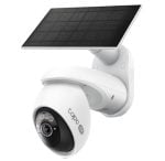 White outdoor security camera with a rooftop solar panel mounted above it, designed for solar-powered surveillance in all weather.