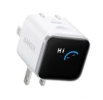 Compact Anker wall plug with a small black display showing the word 'Hi' and a blue gauge, indicating a smart status indicator for charging devices