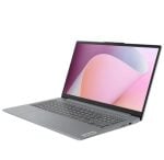 Silver Lenovo laptop opened at a slight angle, displaying a pink abstract wallpaper on the screen.