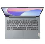 Top-down view of a gray Lenovo laptop open, showing keyboard, touchpad, and hinge stability.