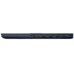 Side view of a dark blue laptop showing its ports: audio jacks, USB, HDMI, and power connector