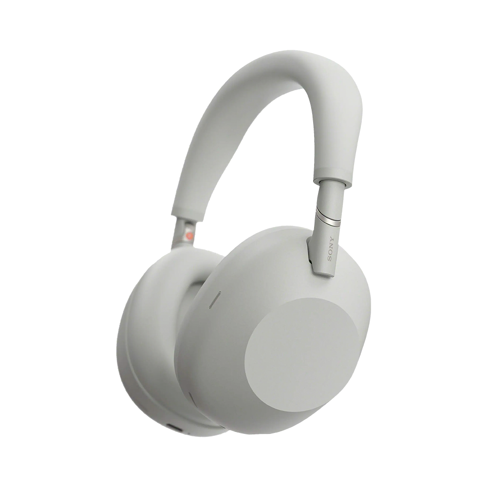 Over-ear white Sony headphones facing left, with cushioned ear cups and matching headband.