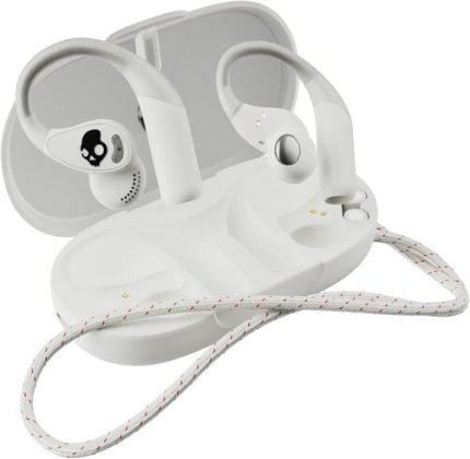White wireless earbuds in an open charging case with a braided white cord; skull logo visible on one earbud.