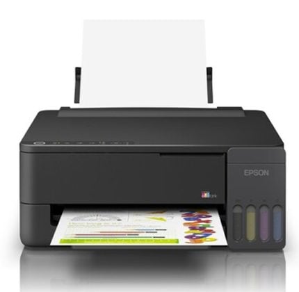 Epson inkjet printer printing a color document with the four ink cartridges visible on the right side.