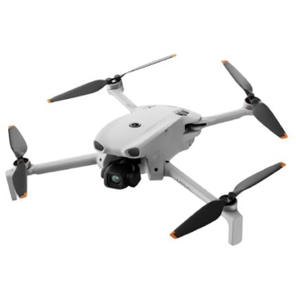 White quadcopter drone with four propellers, orange-tipped blades, and a front-facing camera.