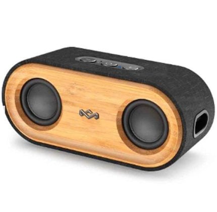 Portable Bluetooth speaker with a wood front panel, two circular drivers, and a black fabric exterior.