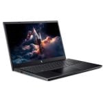 Open black laptop at a slight angle displaying a space-themed wallpaper with stars and clouds of pink and orange hues