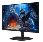 Black computer monitor on a stand displaying a sci‑fi game scene: a armored rider on a motorcycle charging toward a glowing cavern doorway.
