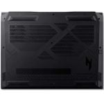 Back view of a black rugged laptop with large cooling vents, angular panels, and a stylized logo on the right.