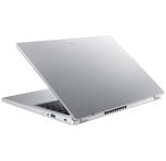 Silver laptop partially open, showing keyboard and side ports on a slim, minimalist design.